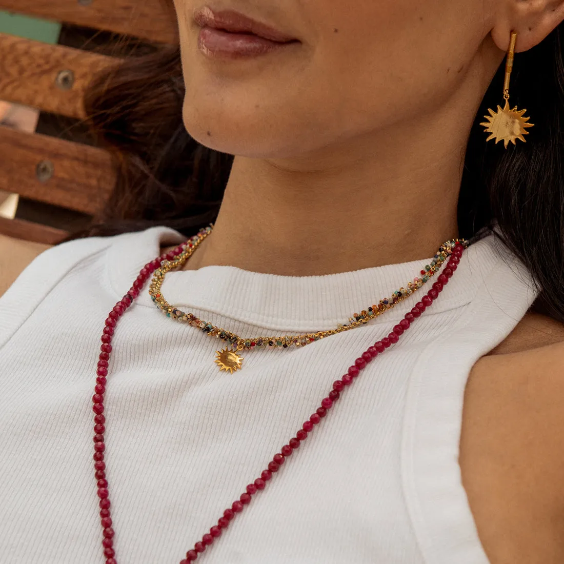 Beaded choker with Gold plated Sun charm
